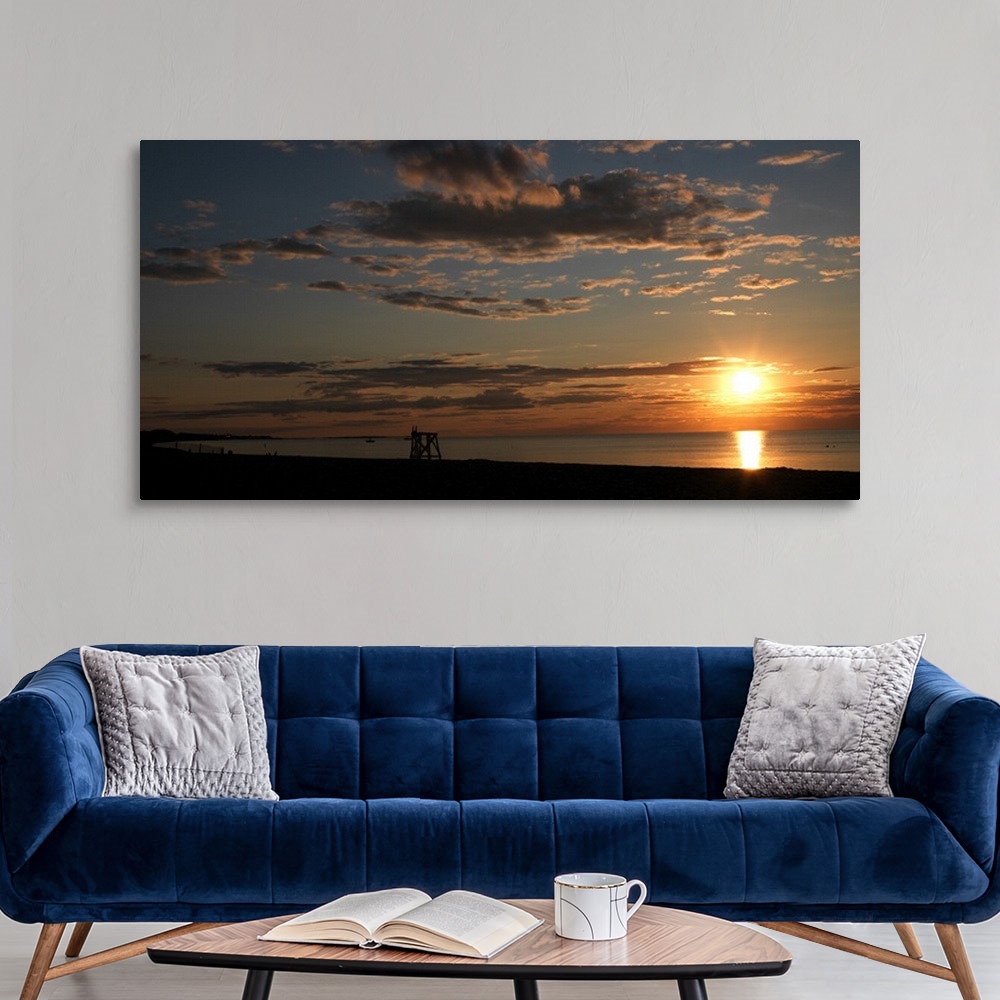 A modern room featuring Sunset over the ocean, Jetties Beach, Nantucket, Massachusetts