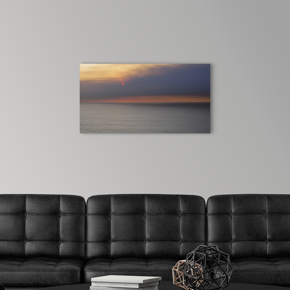 A modern room featuring Sunset over the ocean, Montara, San Mateo County, California