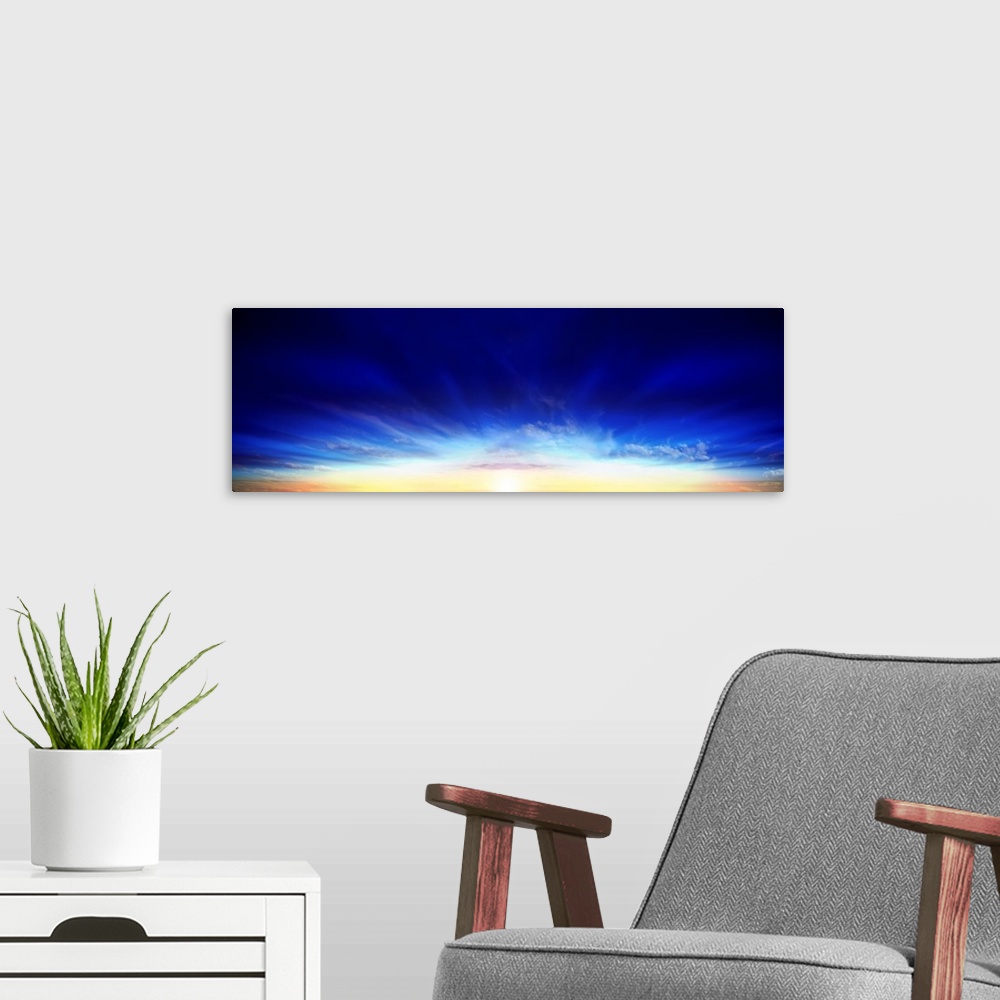 A modern room featuring Sunset over the sea