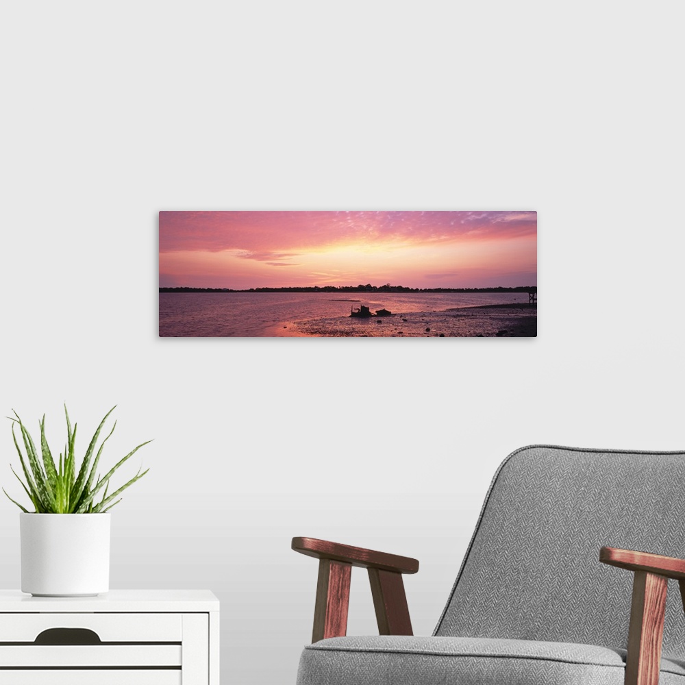 A modern room featuring Sunset over the sea, Gulf of Mexico, Cedar Key, Florida
