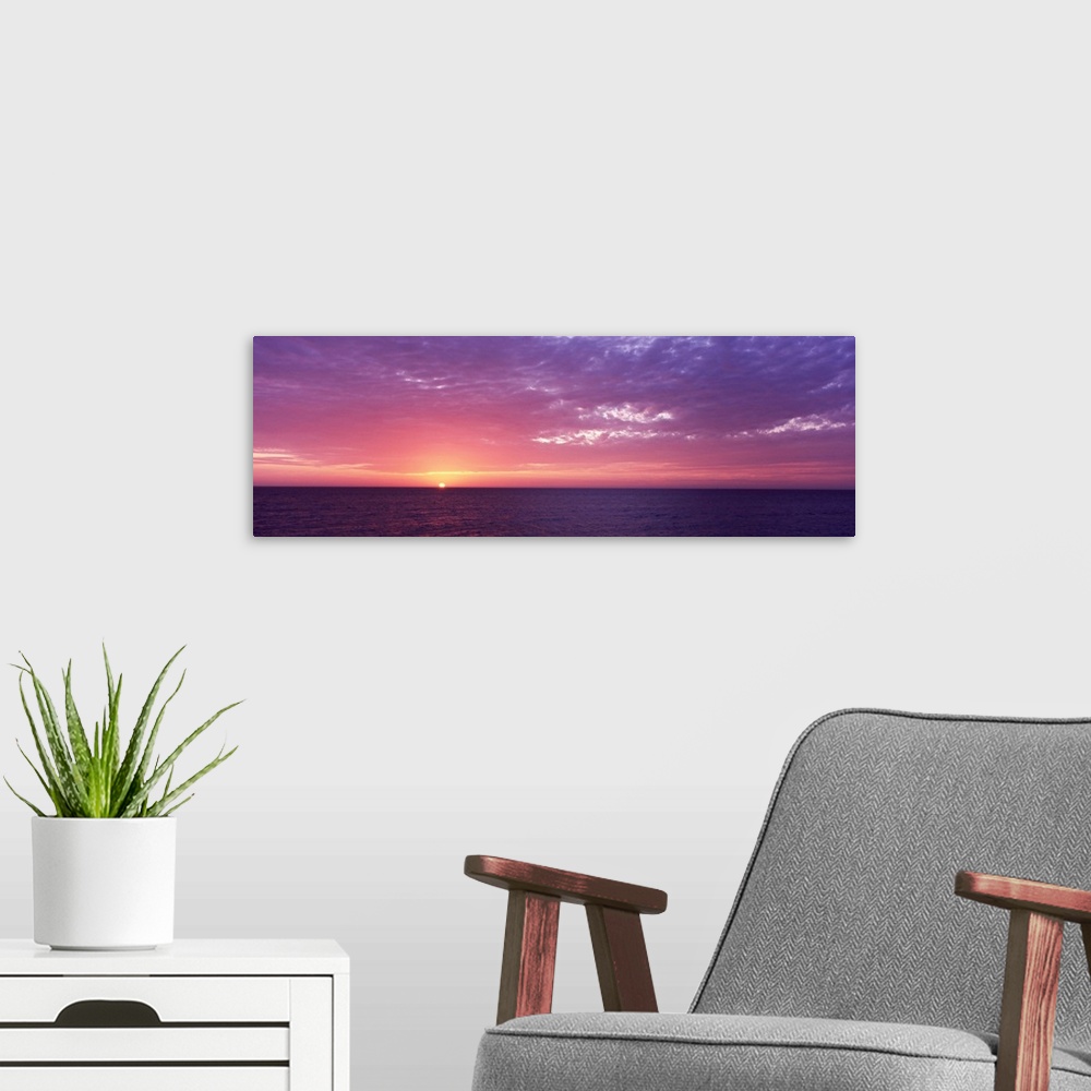 A modern room featuring Sunset over the sea, Gulf Of Mexico, Venice Beach, Venice, Sarasota County, Florida