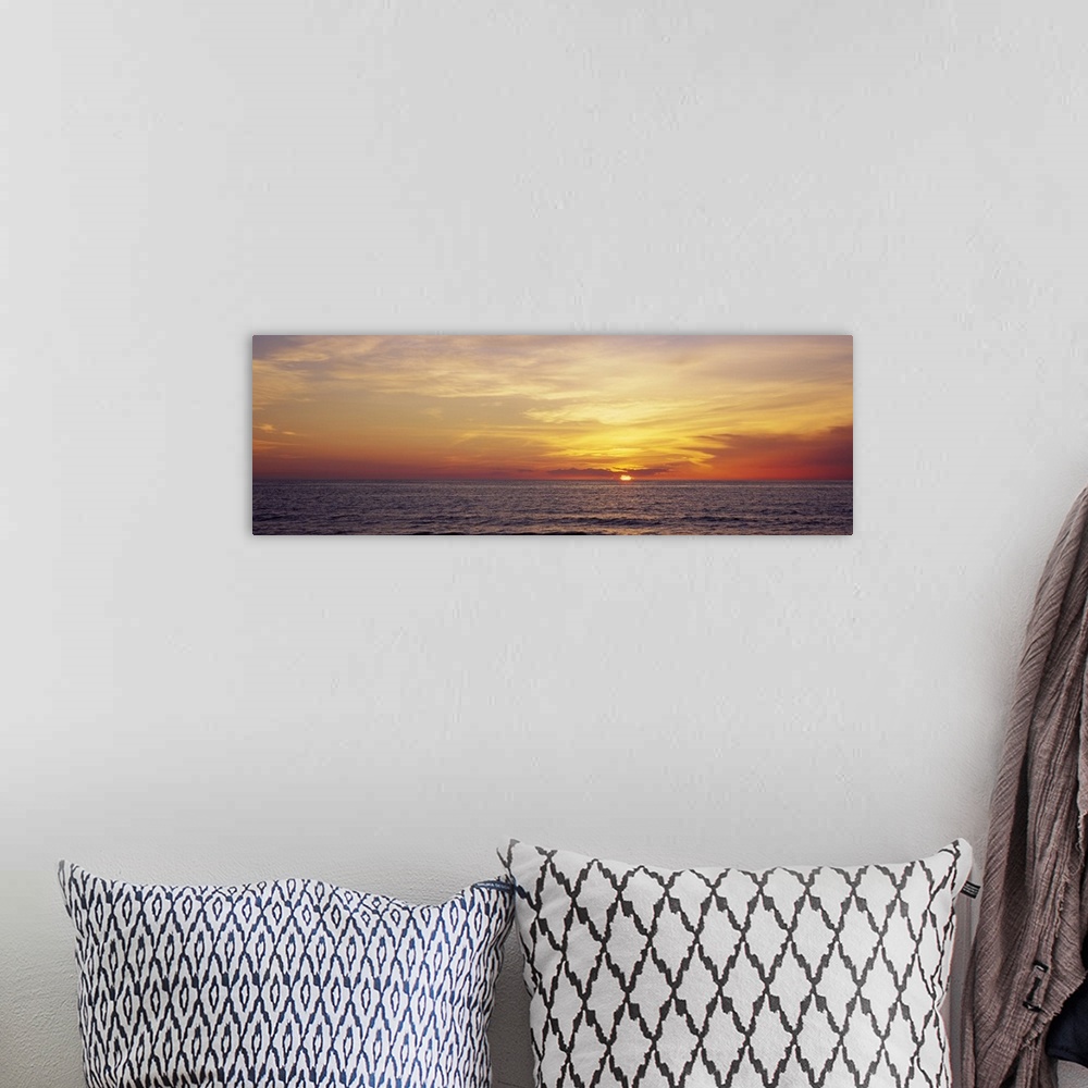 A bohemian room featuring Sunset over the sea, Gulf Of Mexico, Venice, Sarasota County, Florida