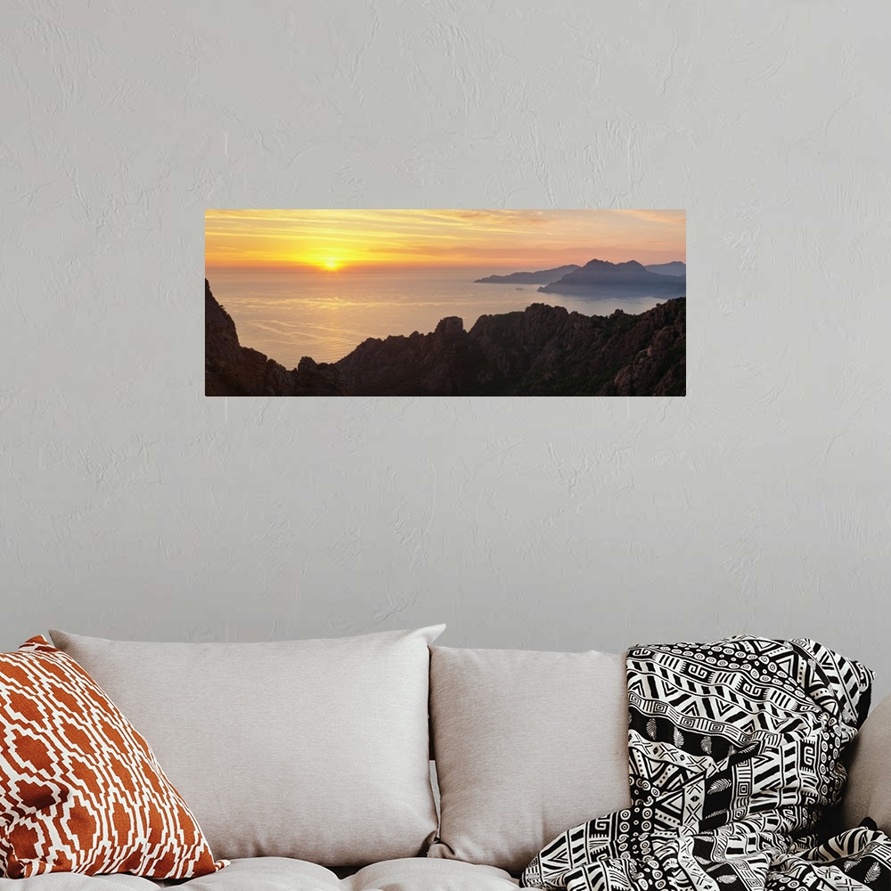 A bohemian room featuring Sunset over the sea, Les Calanche De Piana, Gulf Of Porto, Corsica, France
