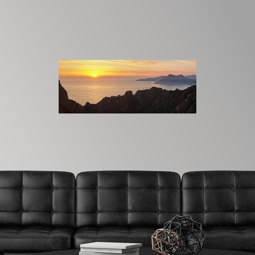 A modern room featuring Sunset over the sea, Les Calanche De Piana, Gulf Of Porto, Corsica, France