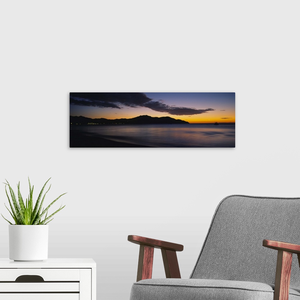 A modern room featuring Sunset over the sea, Playa Del Coco, Liberia, Guanacaste, Costa Rica