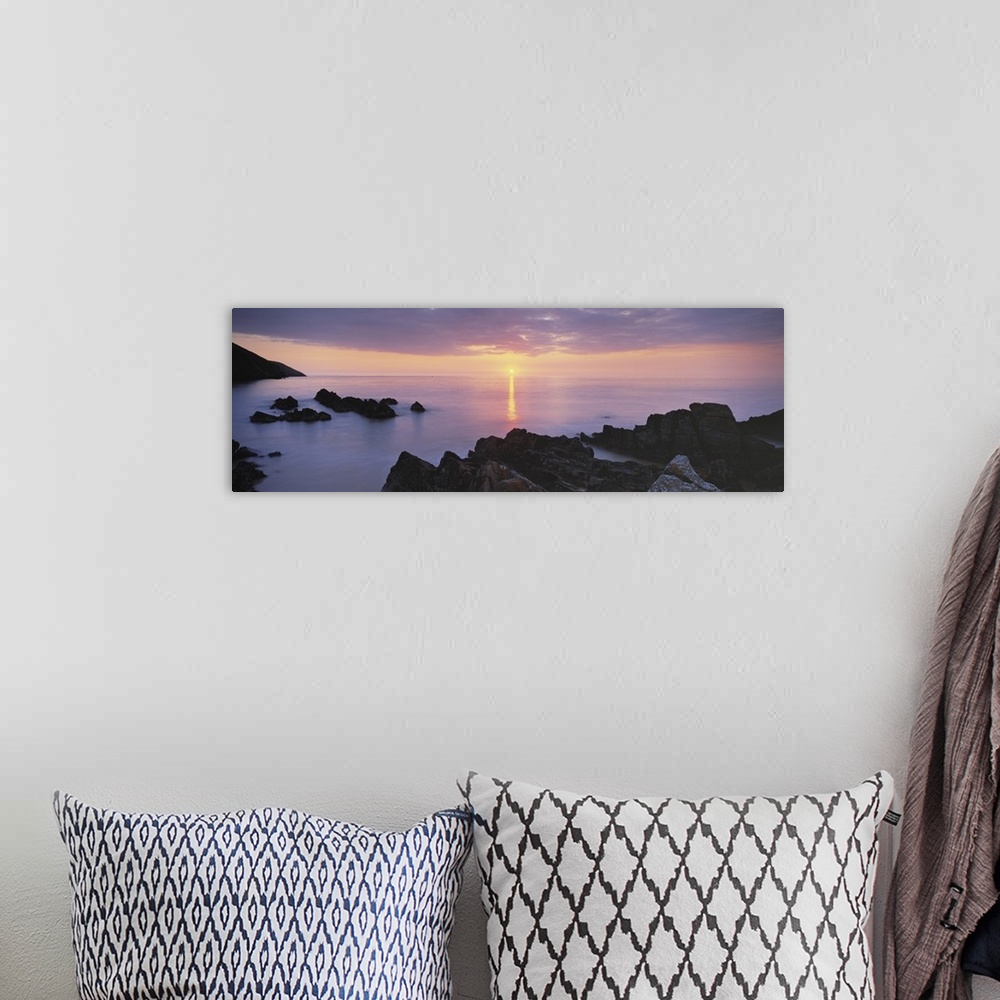 A bohemian room featuring Sunset over the sea, Putsborough, Woolacombe, North Devon, Devon, England
