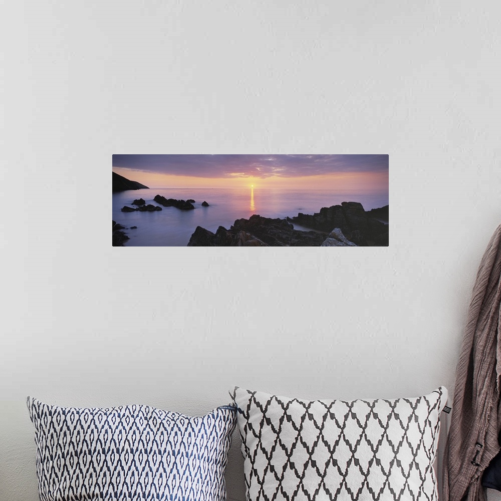 A bohemian room featuring Sunset over the sea, Putsborough, Woolacombe, North Devon, Devon, England