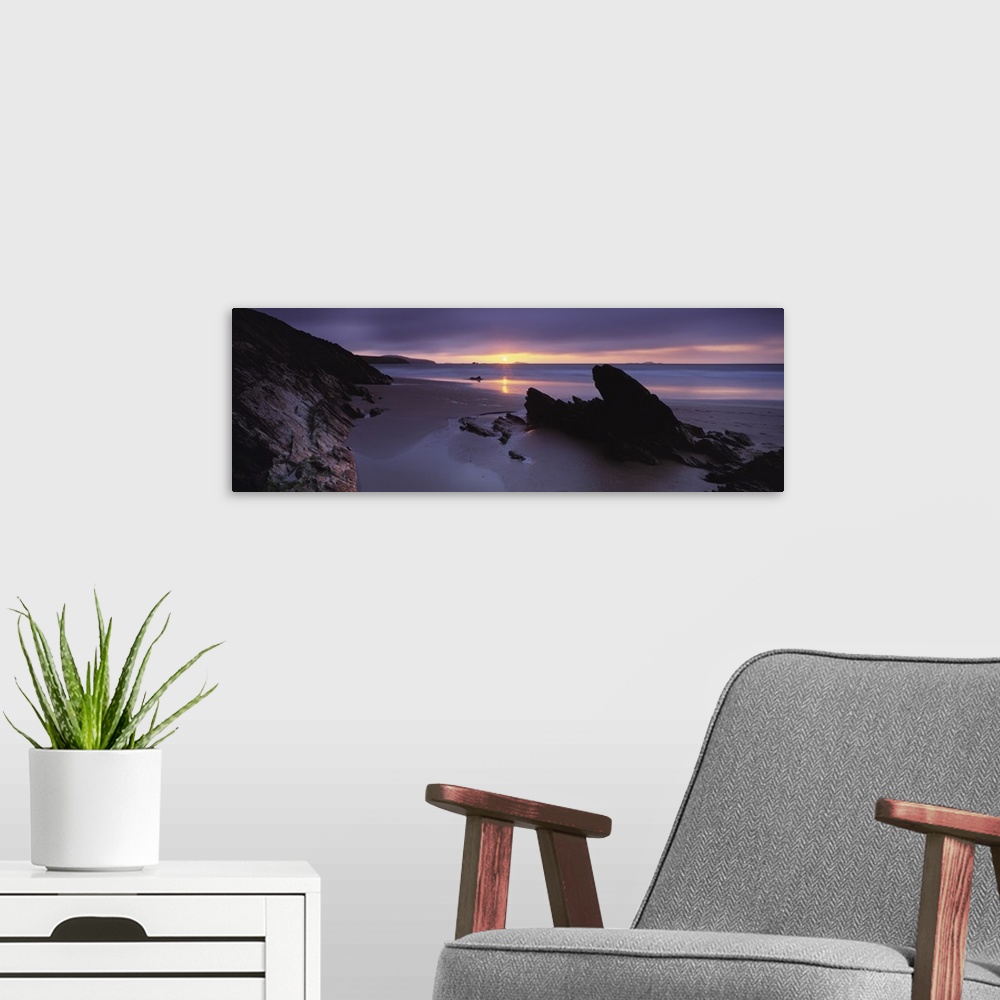 A modern room featuring Sunset over the sea Whitesand Bay Pembrokeshire Wales
