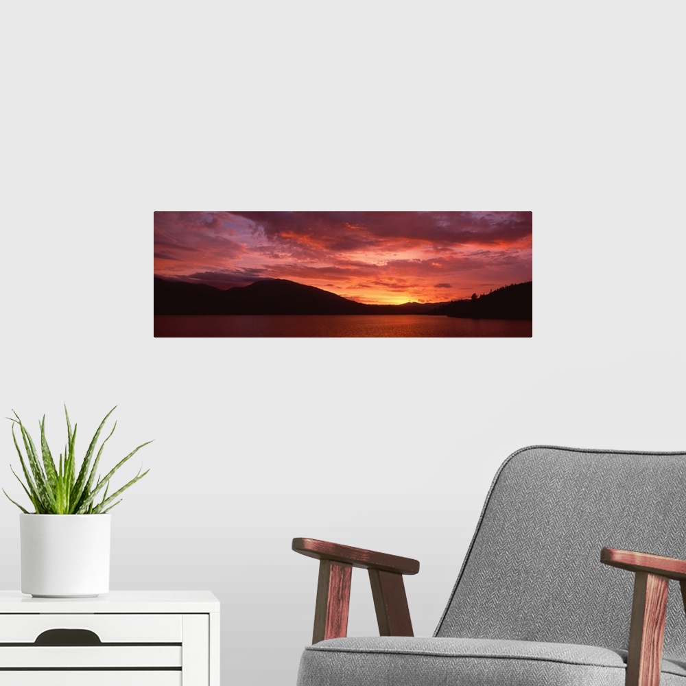 A modern room featuring Sunset over Whiskeytown Lake CA