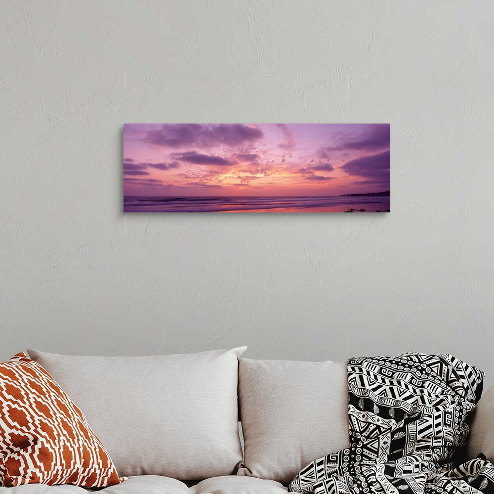 A bohemian room featuring Panoramic photograph of a pastel sunset over the Pacific Beach in San Diego, California, with swi...