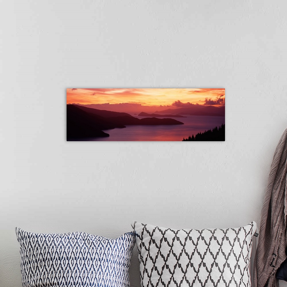 A bohemian room featuring Sunset Queen Charlotte Sound New Zealand