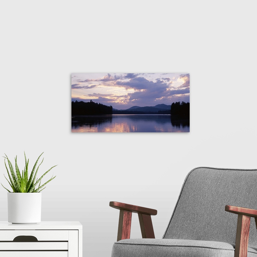 A modern room featuring Sunset Rollins Pond Adirondack Mountains NY