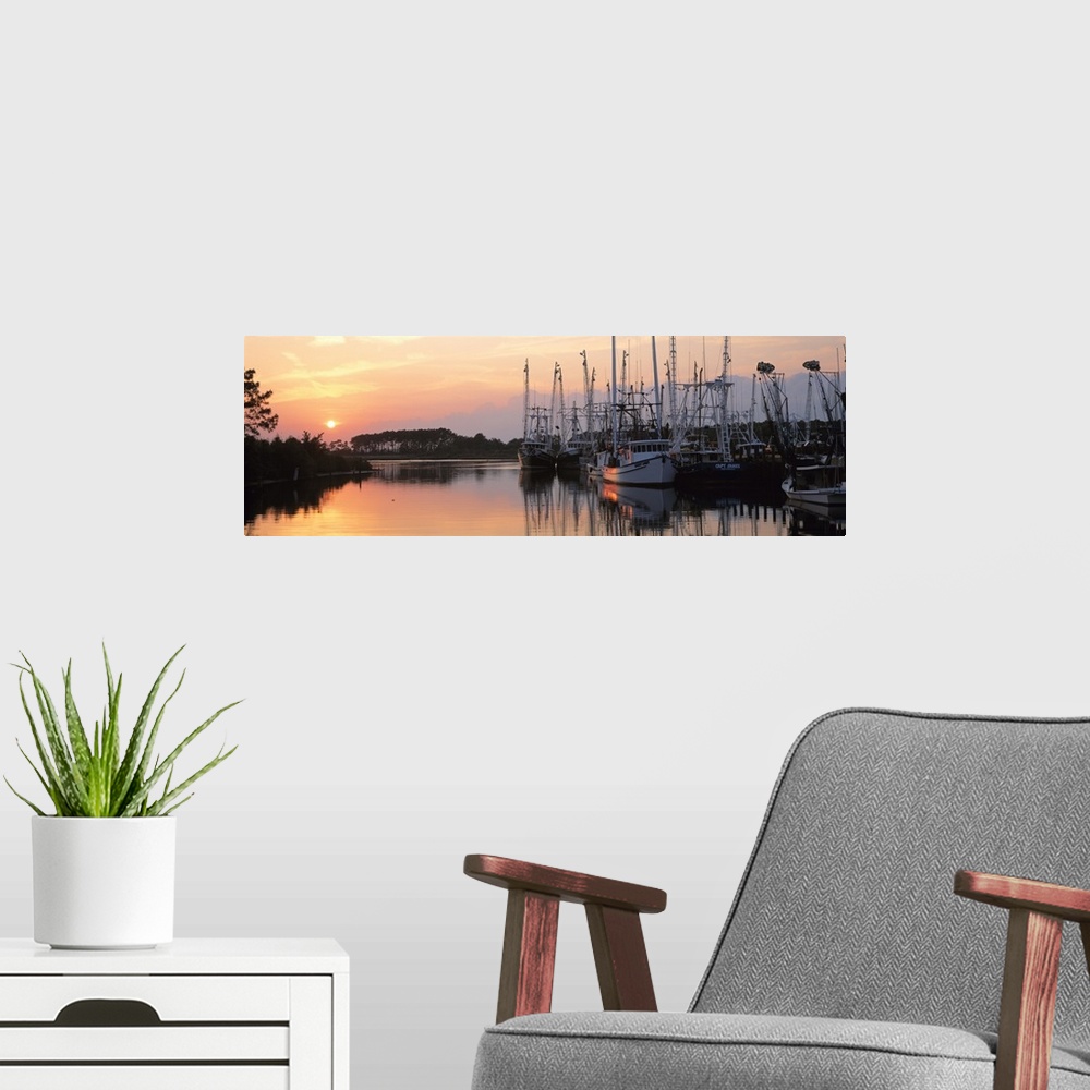 A modern room featuring Sunset Shrimp Boats AL