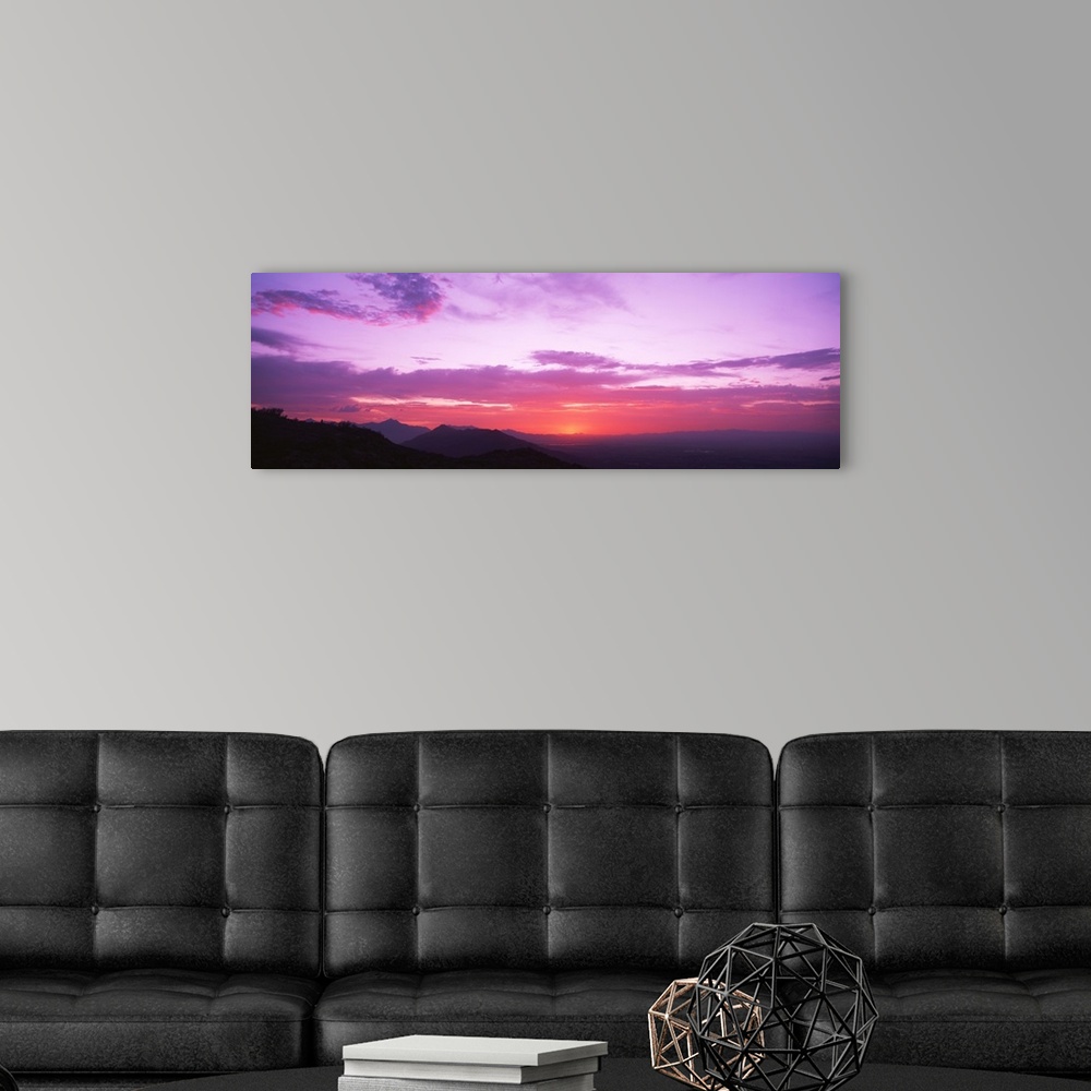 A modern room featuring Sunset Sierra Estrella Mountains Phoenix AZ