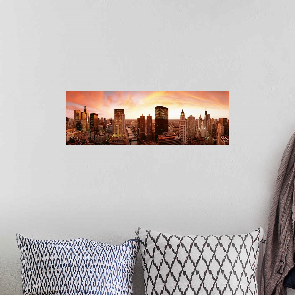 A bohemian room featuring Wide angle panoramic photograph of skyscrapers in the later afternoon.