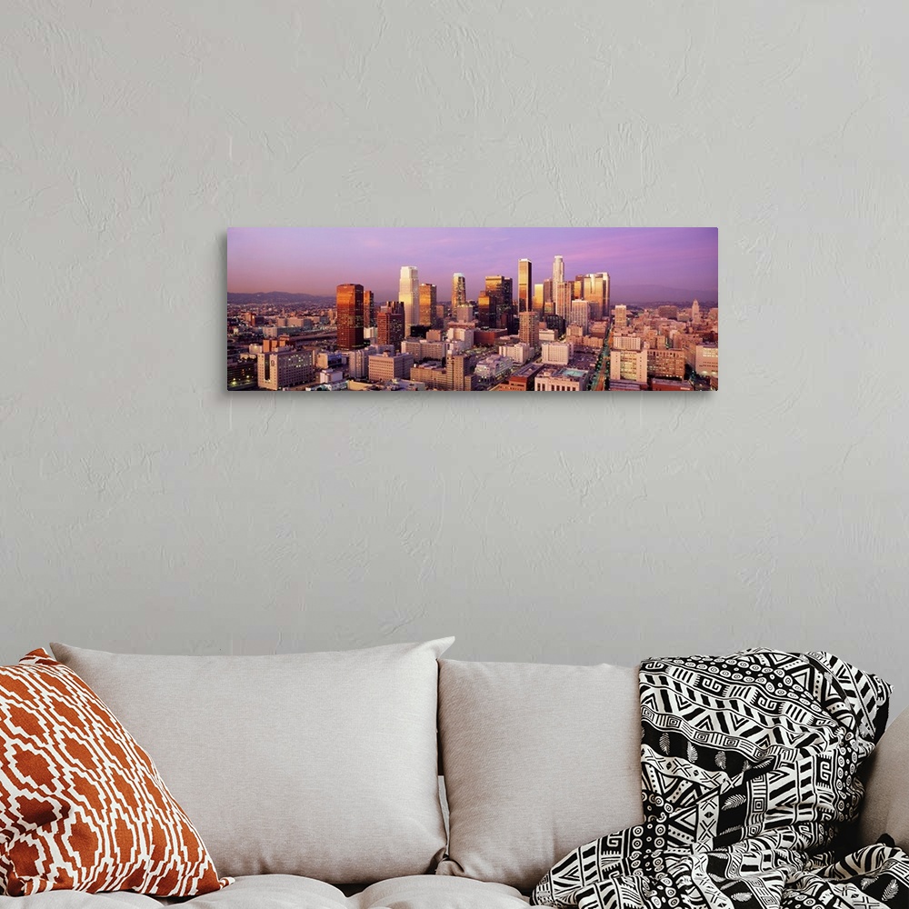 A bohemian room featuring Giant horizontal panoramic photograph of the city of Los Angeles, California (CA) as the sun begi...