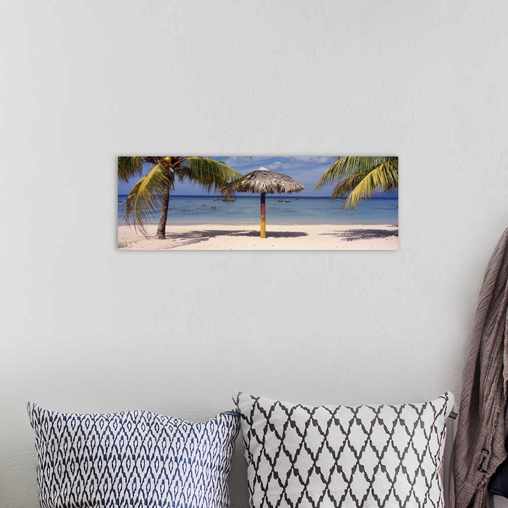 A bohemian room featuring Sunshade on the beach La Boca Cuba
