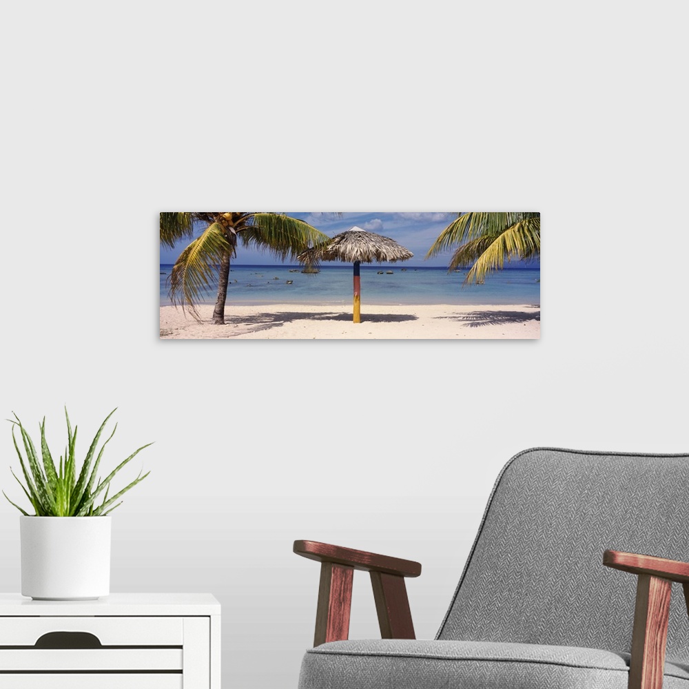 A modern room featuring Sunshade on the beach La Boca Cuba