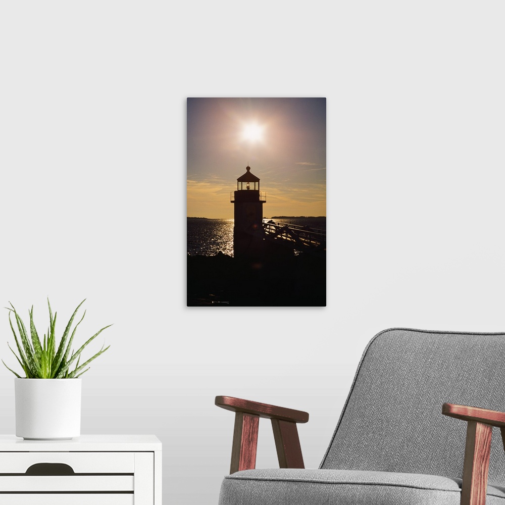 A modern room featuring Sunstar Over Silhouetted Marshall Point Lighthouse