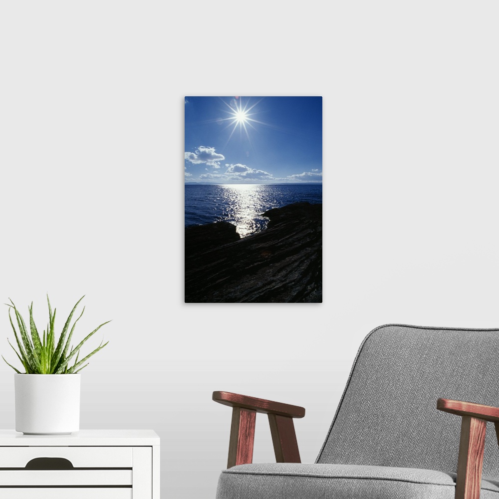 A modern room featuring Sunstar Over Yellowstone Lake