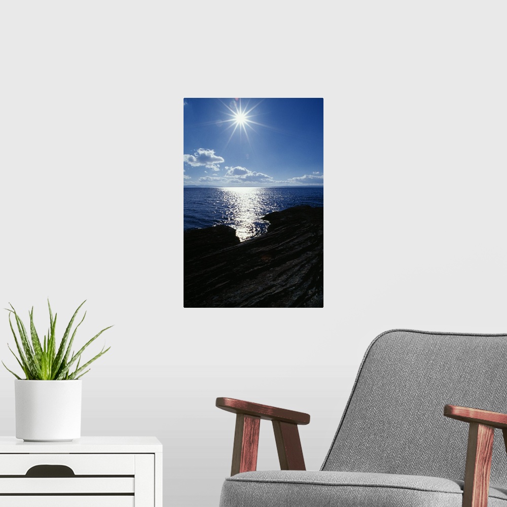 A modern room featuring Sunstar Over Yellowstone Lake
