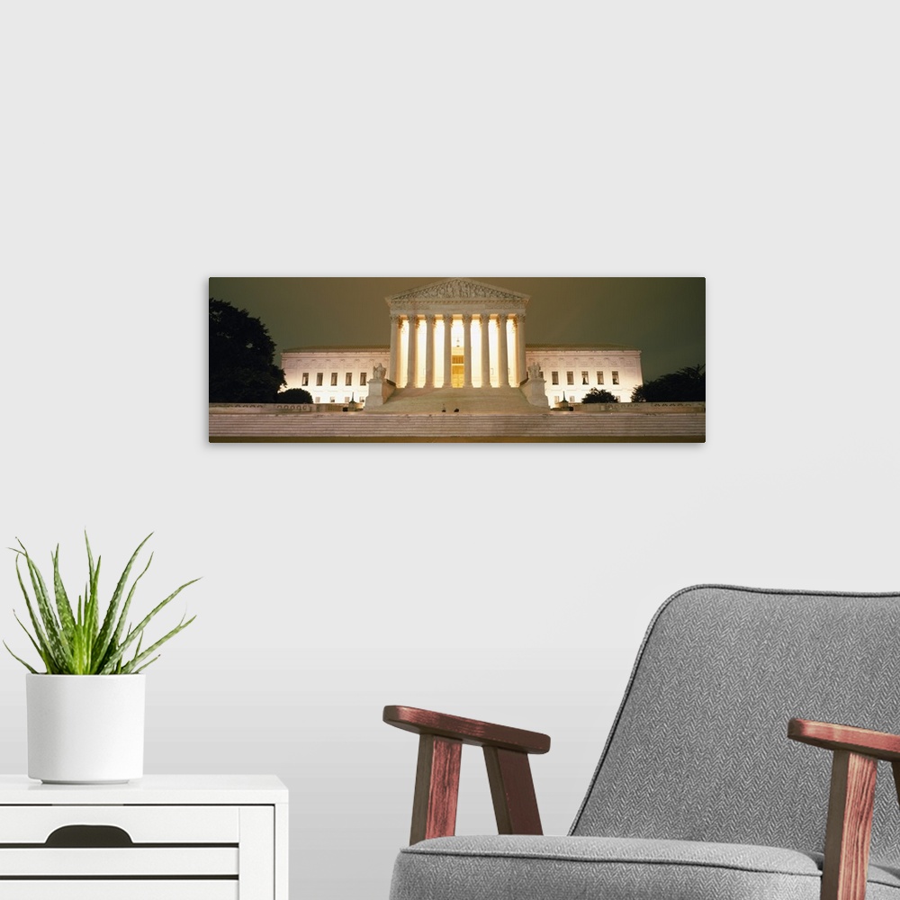 A modern room featuring Large, panoramic, low angle photograph of the Supreme Court Building in Washington DC, brightly l...