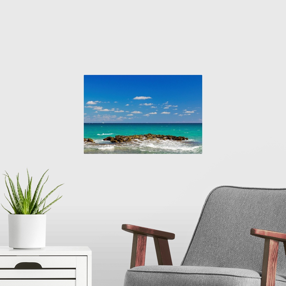 A modern room featuring Surf on the beach, West Palm Beach, Florida