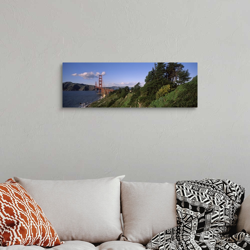 A bohemian room featuring Suspension bridge across the bay, Golden Gate Bridge, San Francisco Bay, San Francisco, Californi...