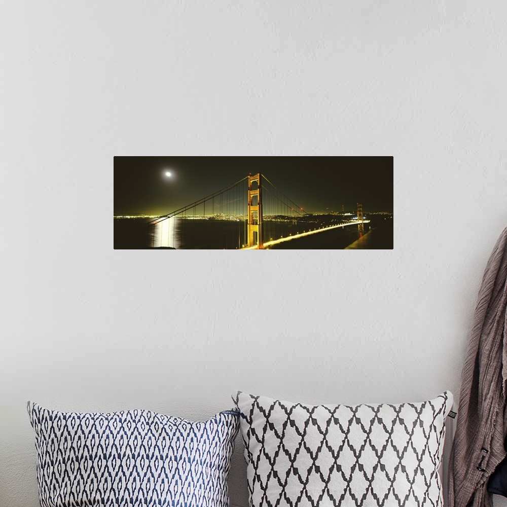 A bohemian room featuring Giant panoramic photograph of the Golden Gate Bridge at night, the moonlight reflecting in the wa...