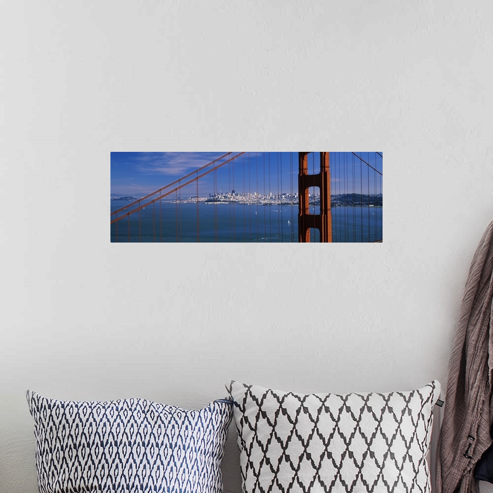 A bohemian room featuring Suspension bridge with a city in the background, Golden Gate Bridge, San Francisco, California,