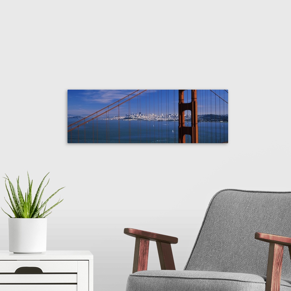 A modern room featuring Suspension bridge with a city in the background, Golden Gate Bridge, San Francisco, California,