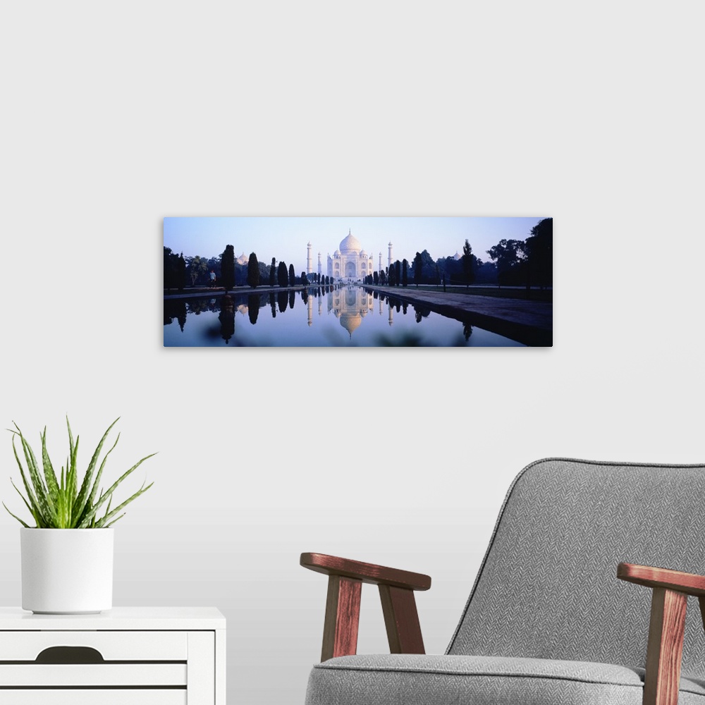 A modern room featuring Panoramic photo on canvas of the Taj Mahal with a reflecting pool in front.