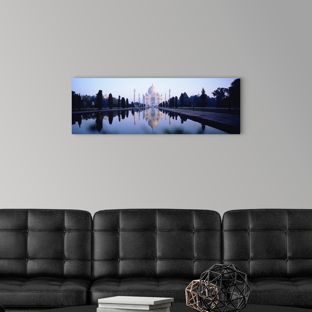 A modern room featuring Panoramic photo on canvas of the Taj Mahal with a reflecting pool in front.
