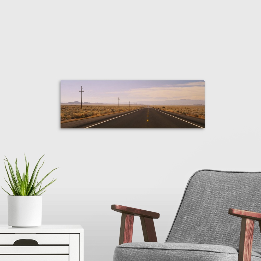 A modern room featuring Telephone poles along a highway, Highwawy 380, New Mexico
