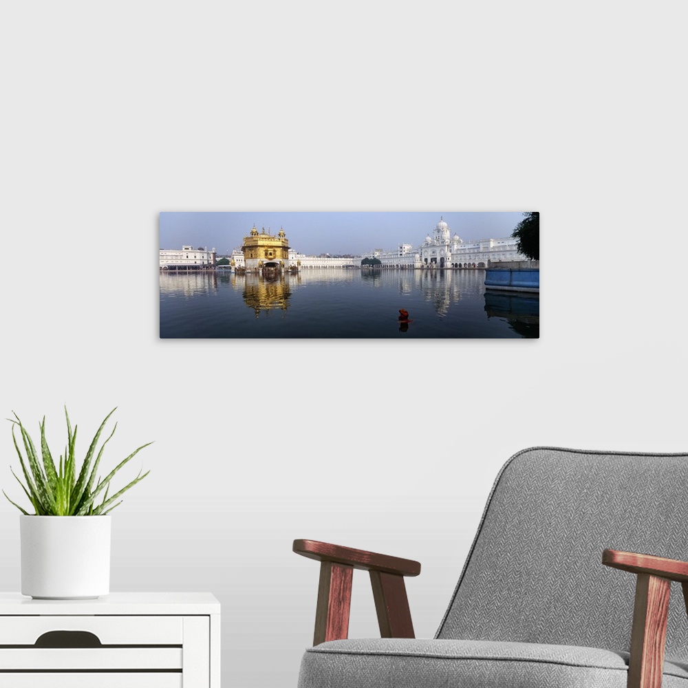 A modern room featuring Temple at the waterfront, Golden Temple, Amritsar, Punjab, India