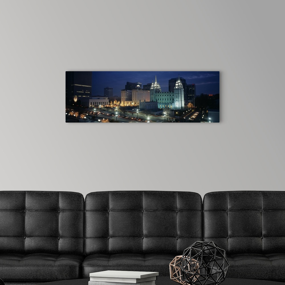 A modern room featuring Panoramic photograph of skyline glowing at dusk.