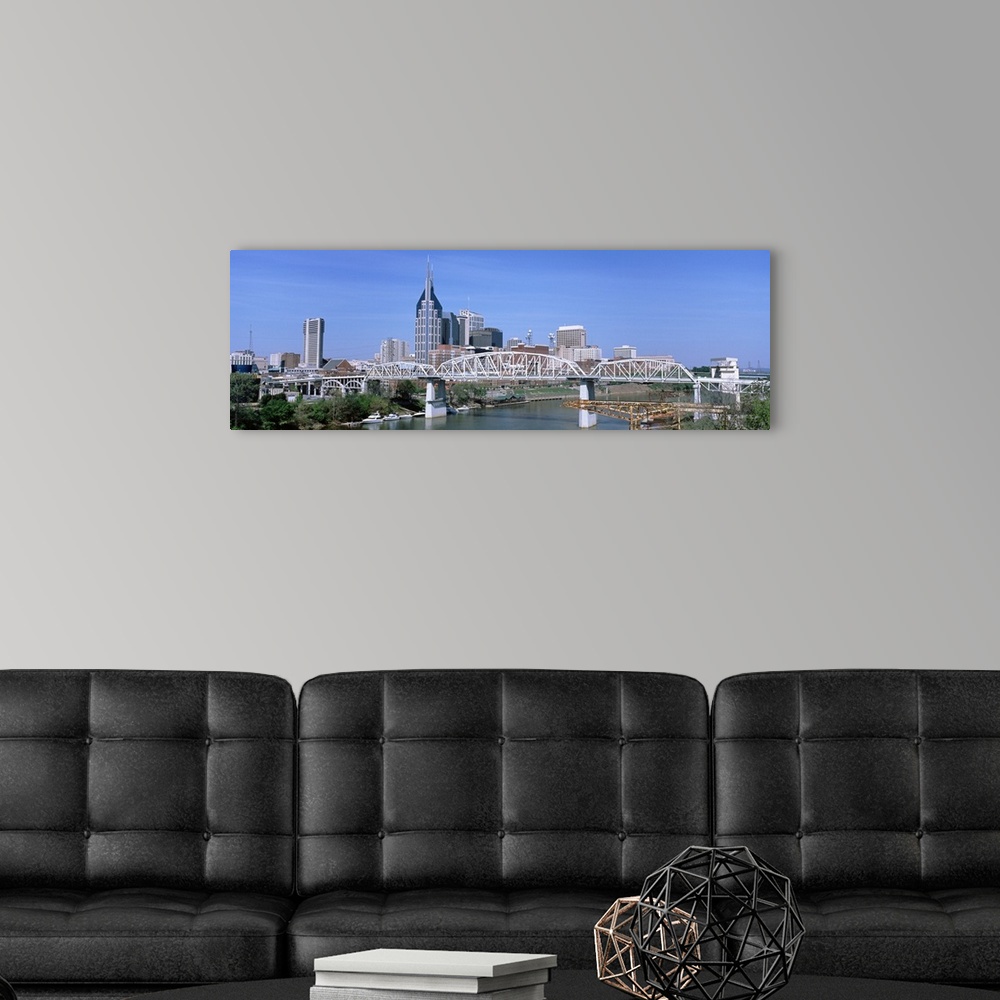 A modern room featuring Cumberland River and downtown panoramic view in Nashville, TN.