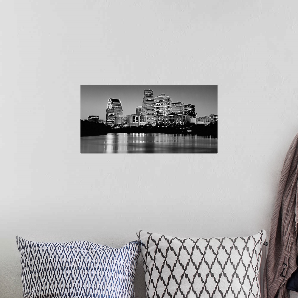 A bohemian room featuring Panoramic monochromatic photograph showcases the busy skyline of a famous city within the Southwe...