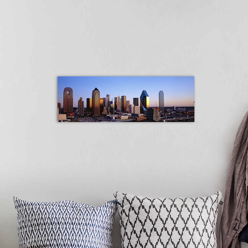 A bohemian room featuring Oversized, panoramic photograph of the Dallas skyline at sunrise.