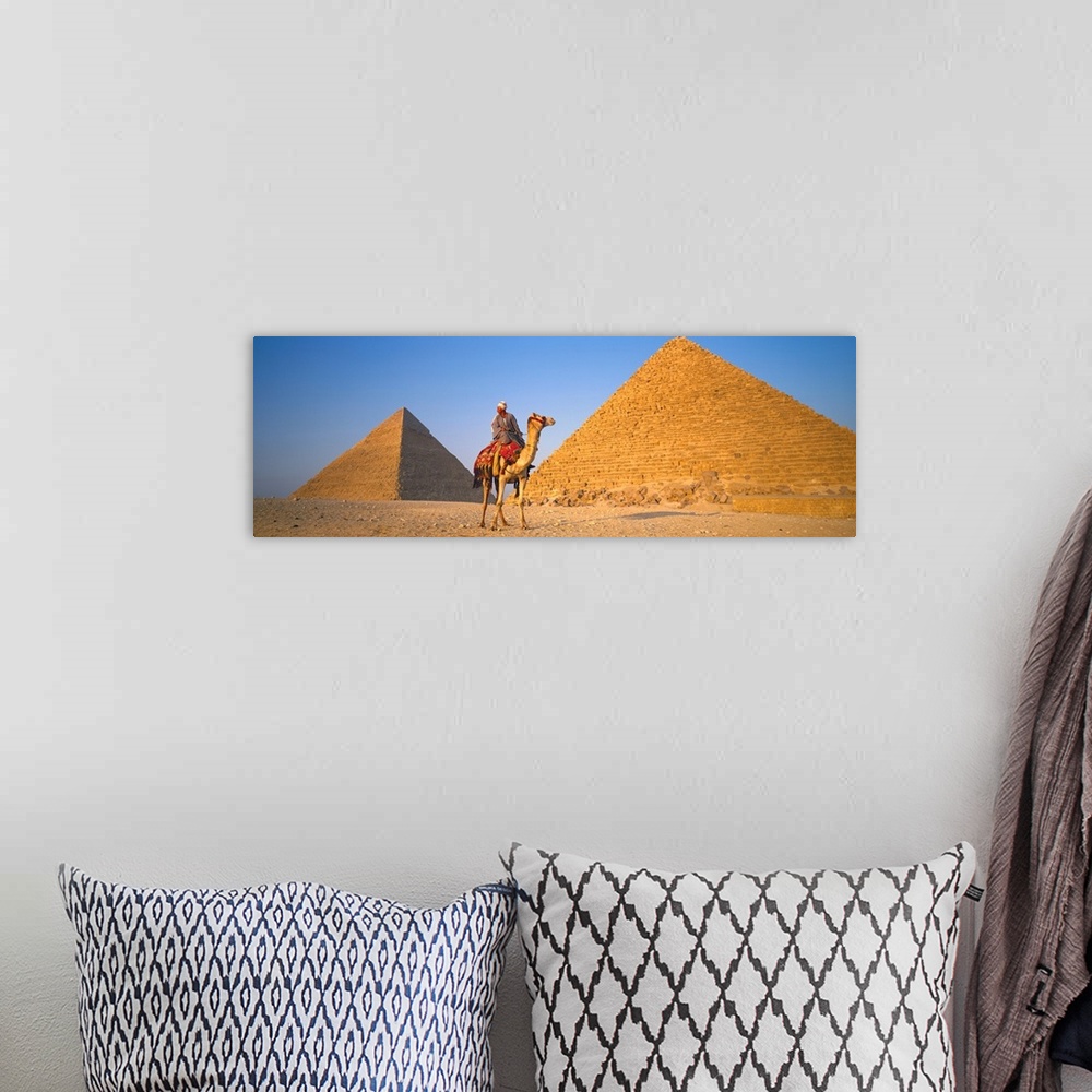 A bohemian room featuring The Great Pyramids With Camel Rider Giza Egypt