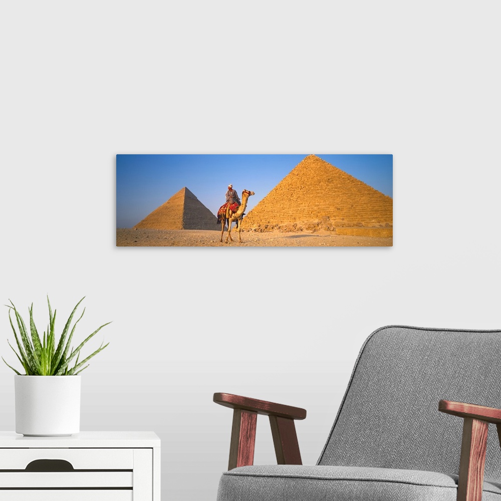 A modern room featuring The Great Pyramids With Camel Rider Giza Egypt