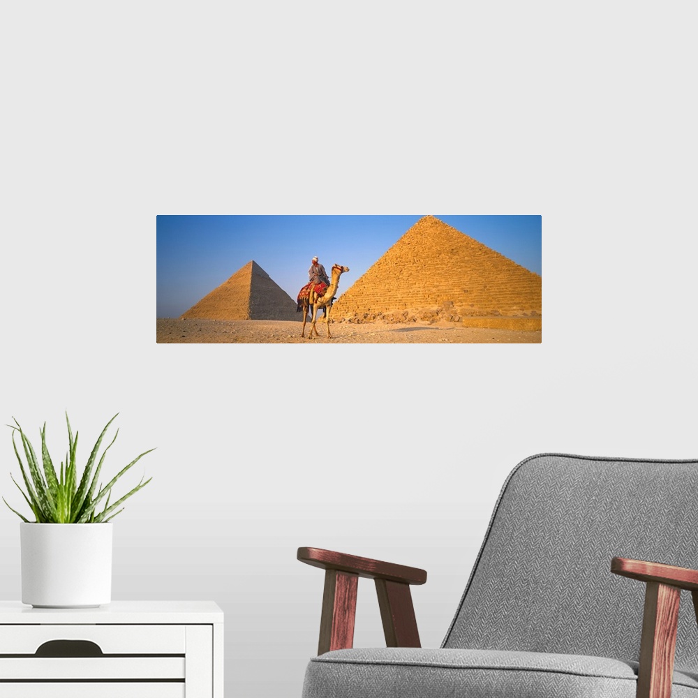 A modern room featuring The Great Pyramids With Camel Rider Giza Egypt