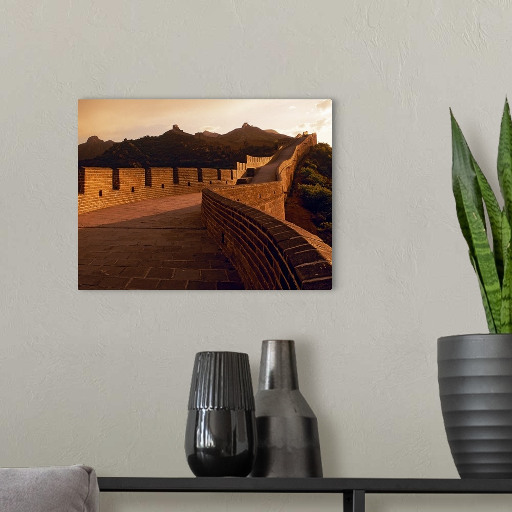A modern room featuring View of the monumental Great Wall at sunset showing the detail in the masonry of the structure.