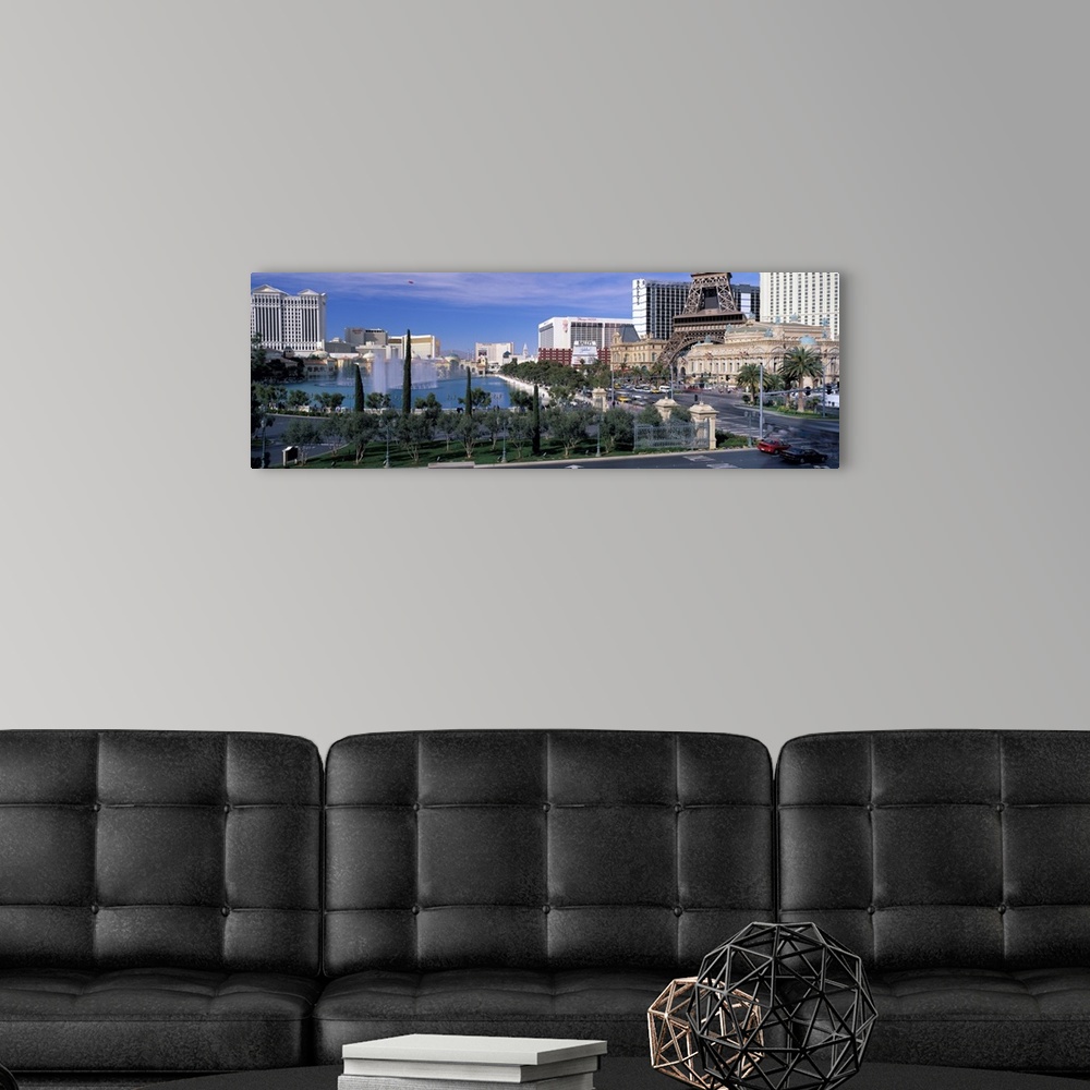 A modern room featuring A panorama of the Las Vegas Strip in Nevada, spanning the Bellagio Fountains and the replica Eiff...