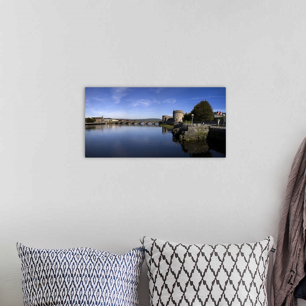 A bohemian room featuring The Thormond Bridge and King Johns Castle, River Shannon, Limerick City, Ireland
