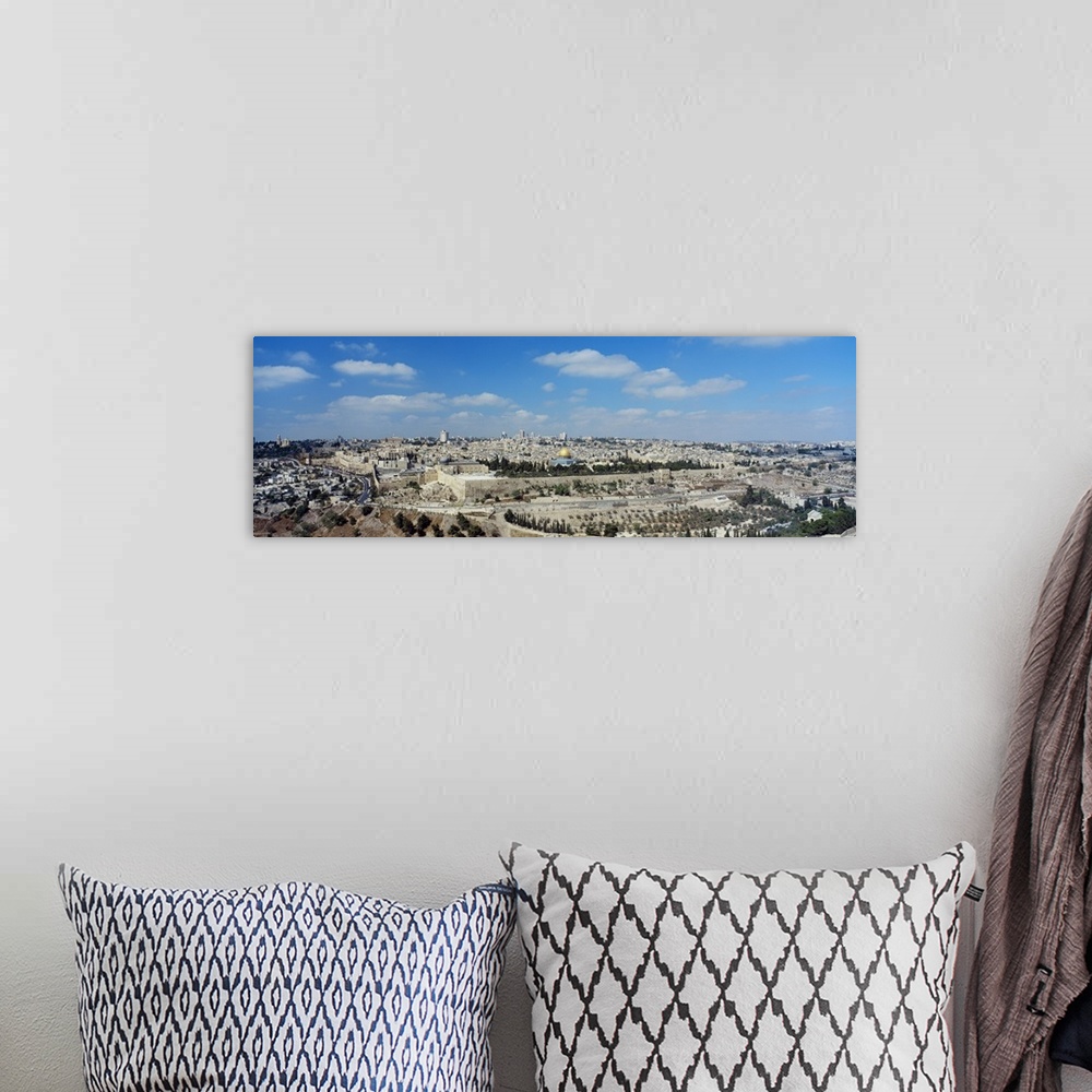 A bohemian room featuring Panoramic photograph of the ""Holy City"" located on a plateau in the Judean Mountains between th...