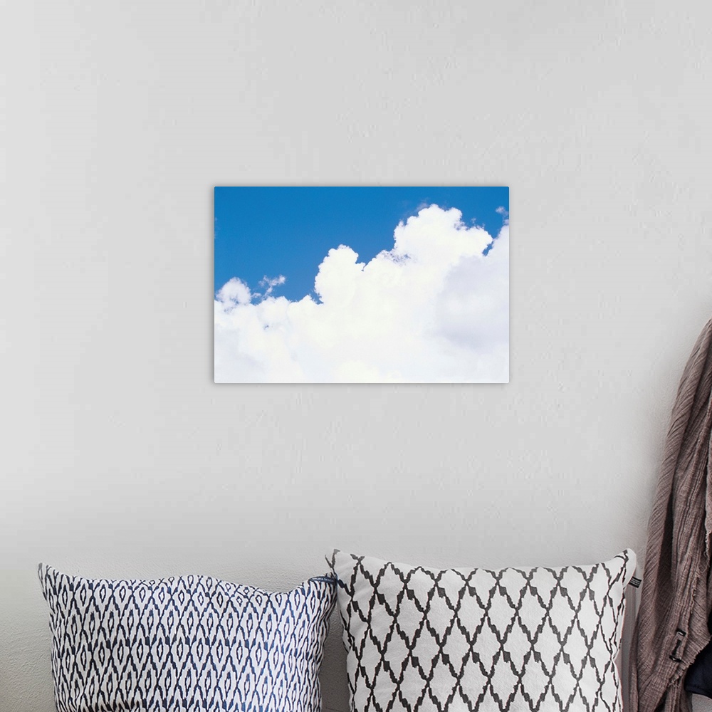 A bohemian room featuring Thick puffy white clouds