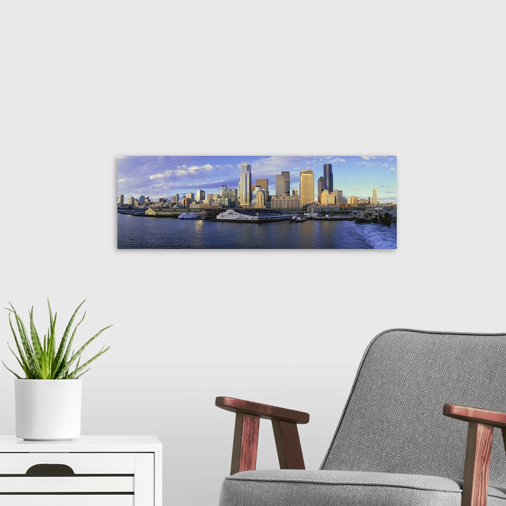 A modern room featuring This is the skyline and harbor of Seattle.