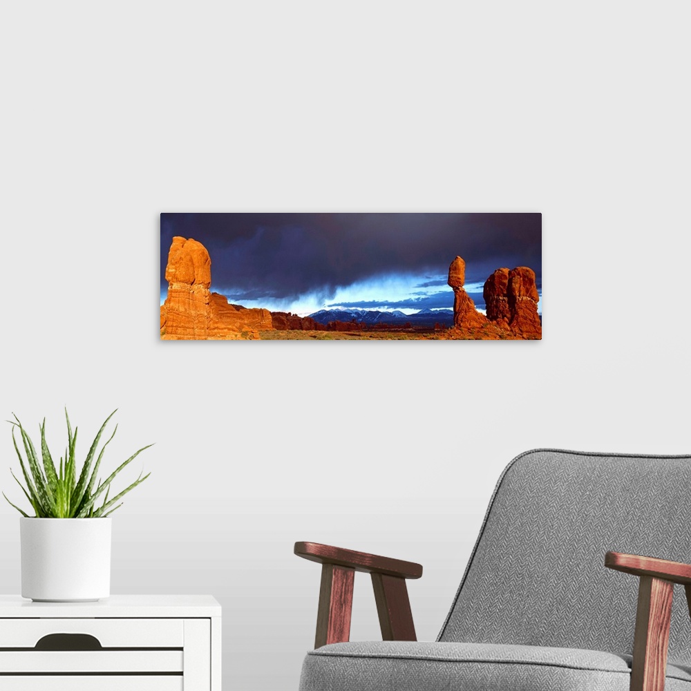A modern room featuring Thunderstorm Arches National Park and Balanced Rock UT