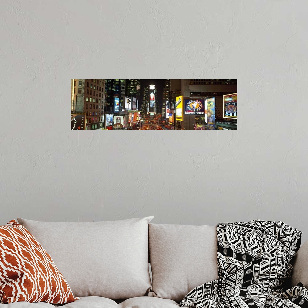 A bohemian room featuring Night view panorama of NYC cityscape and Times Square.